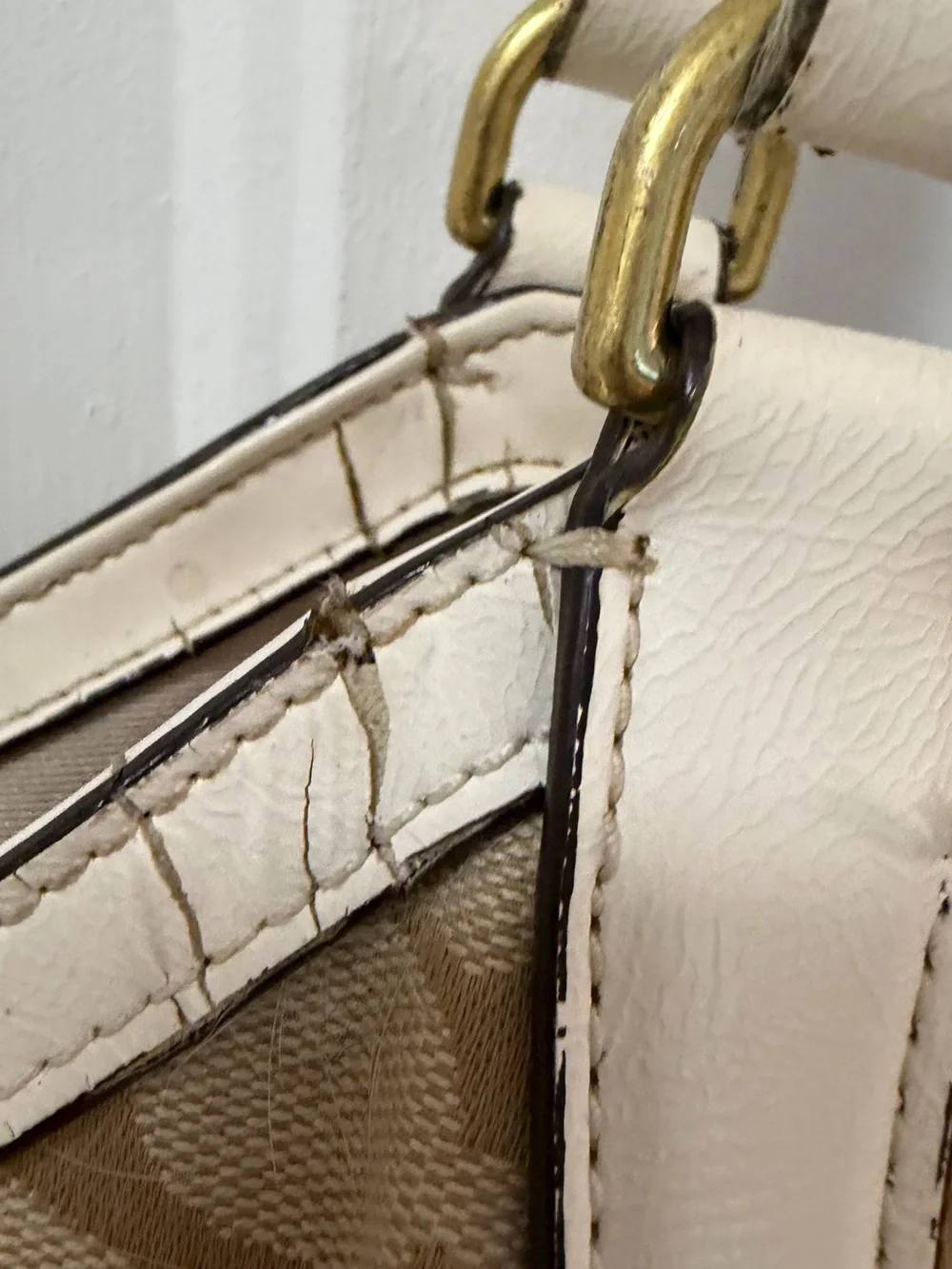 Coach Signature Canvas Beige Tote Bag with Ivory Trim handles are cracked!